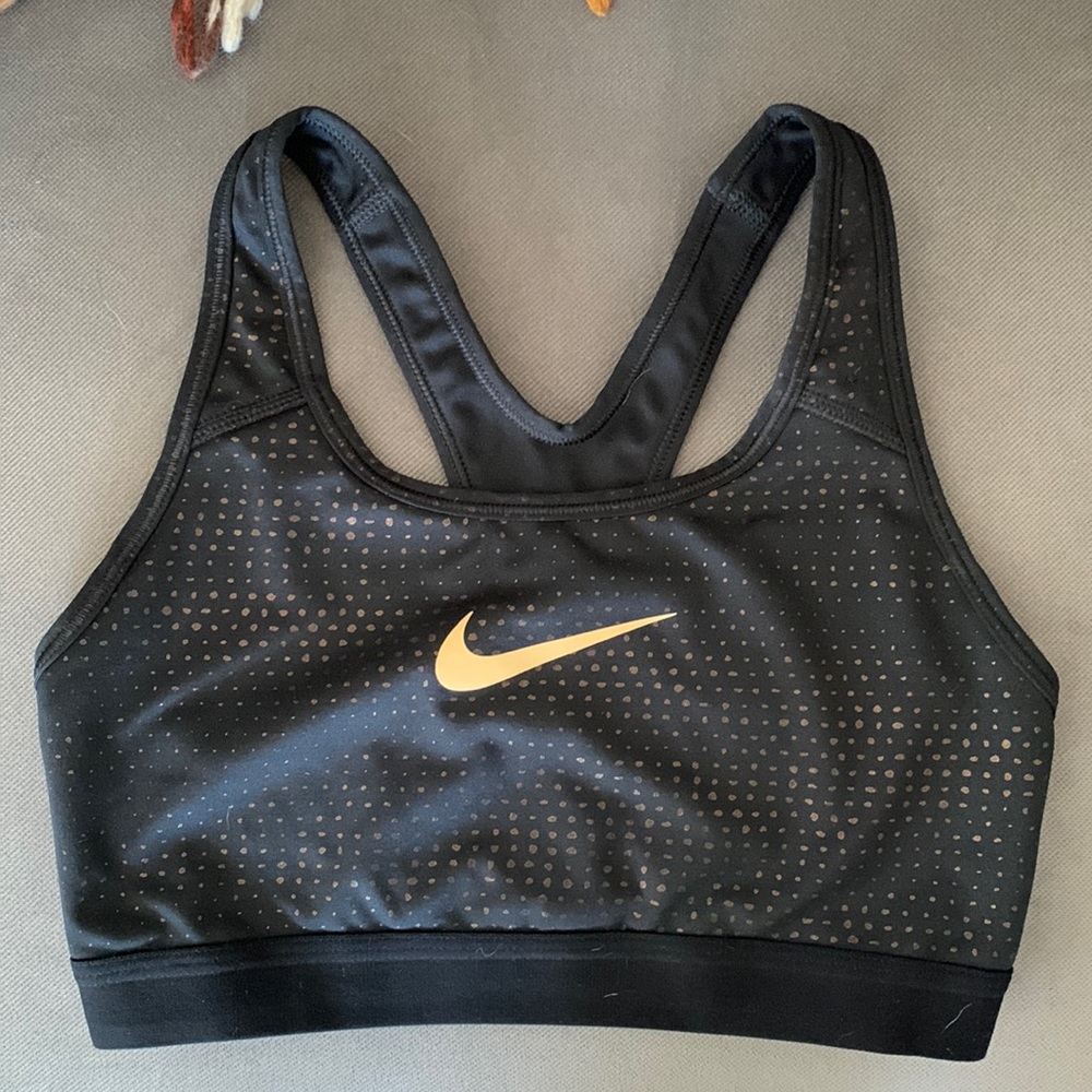 Nike sports bra size small, black and gold, no pads inserted